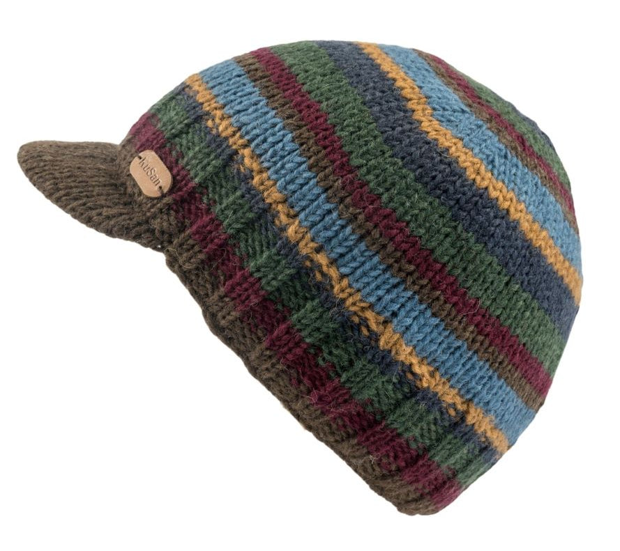 A hand-knit beanie hat with a curved brim, featuring a striped pattern of green, blue, burgundy, and mustard yellow, with a brown brim and a small KuSan brand tag.